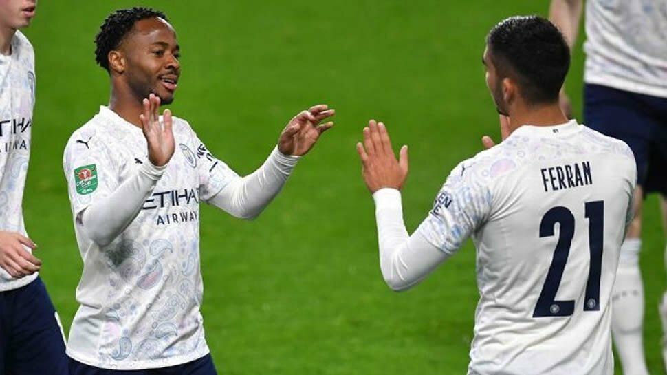 Sterling scores twice as Man City advance to quarters