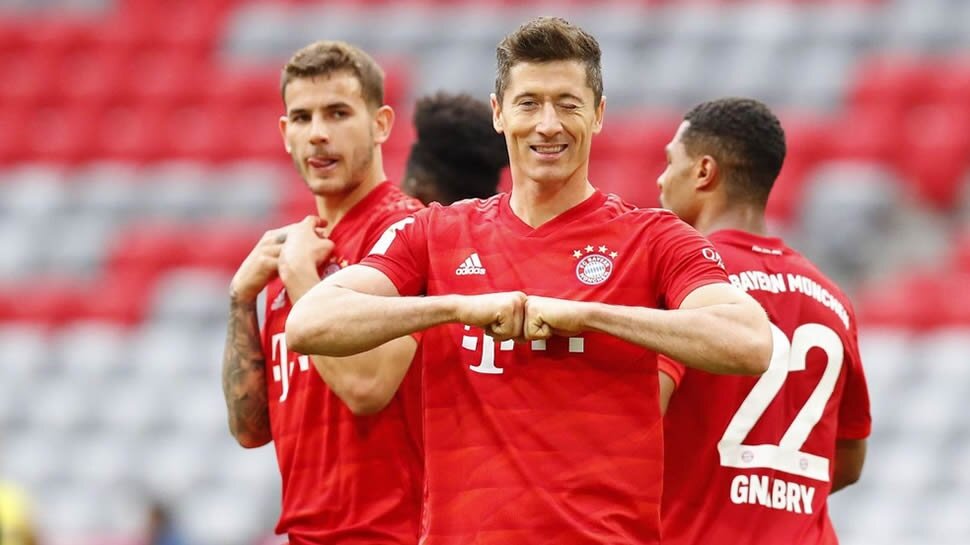 Bayern stride towards title with Dusseldorf thrashing