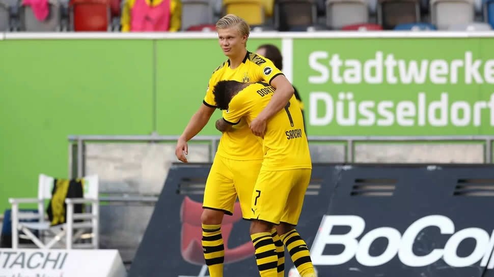 Last-minute Haaland header earns Dortmund win
