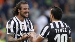 Five-star Juve keep pace with Milan