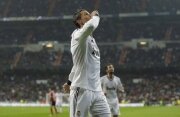 Ronaldo hat-trick fires Real through